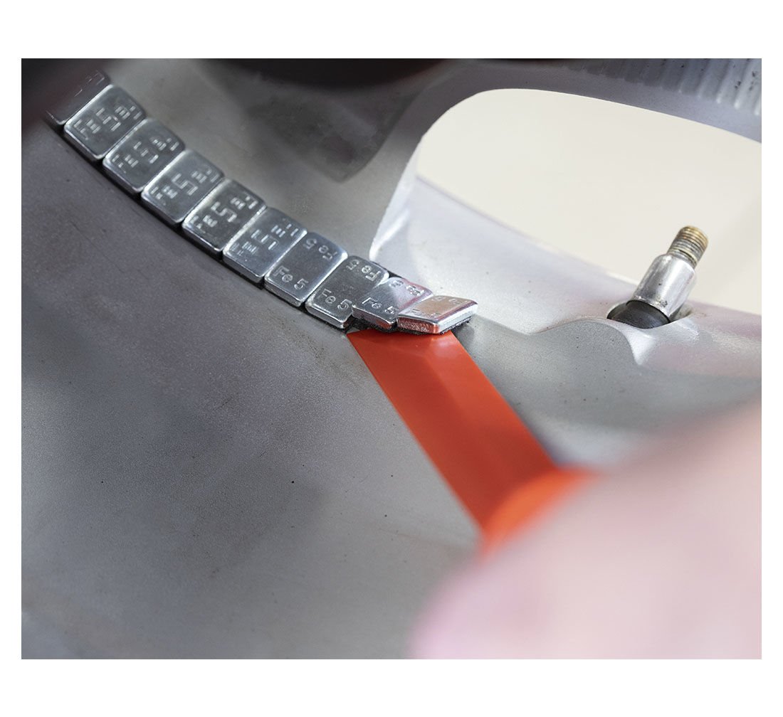 Инструмент за премахване на балансиращи тежести